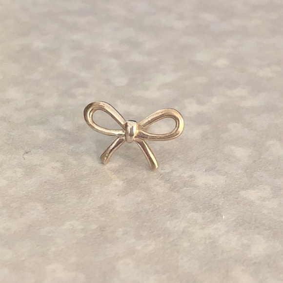 Tiffany & Co. Jewelry - One Tiffany and co bow earring